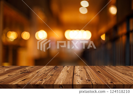 nigh gold orange color tone blur background with wooden table top for advertising montage backdrop 124518210