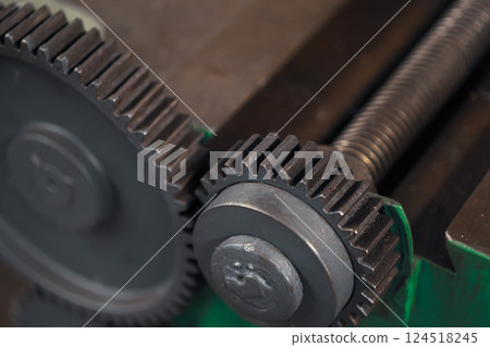 Closeup Gear part, Old grunge metal cog wheel in machine, Heavy industry machinery mechanical. 124518245