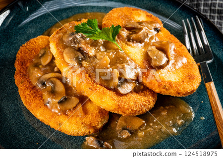 Potato cutlets with mushroom sauce. Potato cutlets with mushroom sauce. 124518975