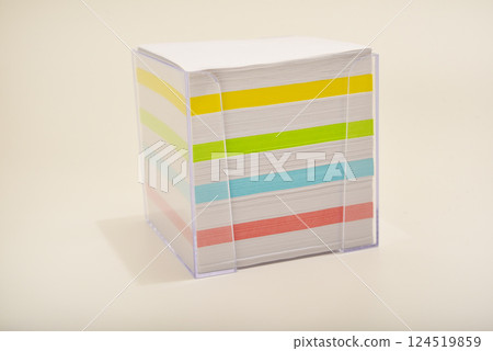 A paper block in the office. A block of paper for notes. 124519859