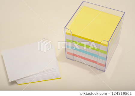 A paper block in the office. A block of paper for notes. 124519861