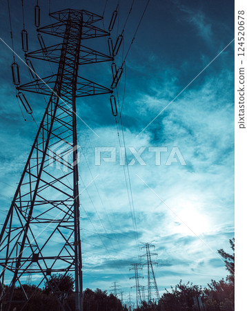 Power Lines Against a Dramatic Skyscape at Dusk Power Lines Against a Dramatic Skyscape at Dusk 124520678
