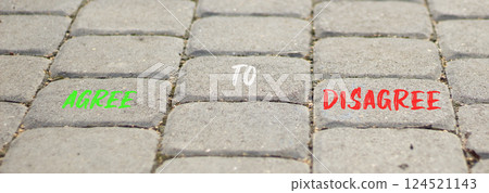 Agree to disagree symbol. Concept words Agree to disagree on beautiful grey road break. Beautiful grey road break background. Business and agree to disagree concept. Copy space. 124521143