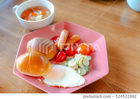 Western-style breakfast plate with bread and fried egg Western-style breakfast plate with bread and fried egg 124522992
