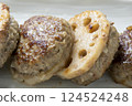 A close-up of lotus root stuffed with meat. 124524248