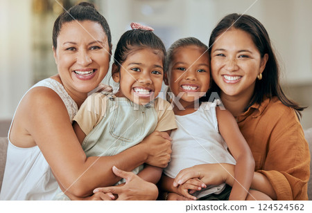 Women, family and smile of children, mother and grandmother together on living room sofa for love, support and happiness. Portrait of kids and diversity female friends sharing hug in Mexico home 124524562
