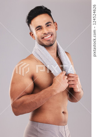 Studio portrait smile, man towel self care against grey wall for cosmetics beauty and healthy skin. Skincare health model, happy cosmetic face and hygiene cloth to relax with body care happiness 124524626