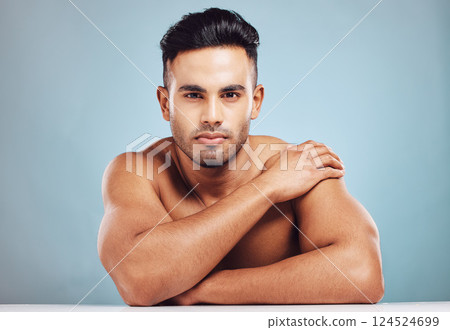 Skincare, wellness and male beauty with india model for cosmetics, health and wellness with skin care, self care and dermatology. Portrait of man in studio for clean, healthy and clear skin in studio Skincare, wellness and male beauty with india model for cosmetics, health and wellness with skin care, self care and dermatology. Portrait of man in studio for clean, healthy and clear skin in studio 124524699