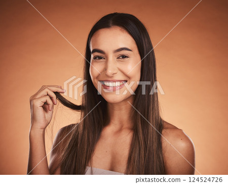 Beauty portrait, skincare and hair care of woman isolated on brown studio background. Wellness, makeup and smile of happy female model from Australia with healthy, long and beautiful silky hair. 124524726