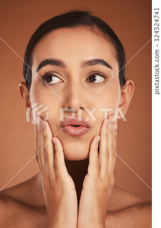 Beauty, woman touch face, skincare and facial, natural cosmetics with clean skin and hands frame in studio background. Makeup, manicure and wellness, fresh glow and cosmetology advertising. 124524741