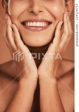 Dental, oral care and closeup of woman teeth with whitening, hygiene and health in a studio. Happy, smile and girl model with a natural, clean and healthy mouth isolated by a brown background. Dental, oral care and closeup of woman teeth with whitening, hygiene and health in a studio. Happy, smile and girl model with a natural, clean and healthy mouth isolated by a brown background. 124524757