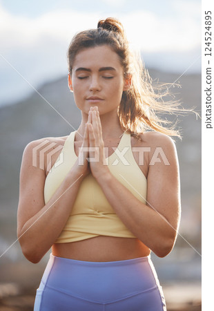 Zen, meditation and woman pray in nature for mental health yoga wellness lifestyle. Young fitness training person, calm spiritual exercise and peace meditate or namaste praying in summer outdoors Zen, meditation and woman pray in nature for mental health yoga wellness lifestyle. Young fitness training person, calm spiritual exercise and peace meditate or namaste praying in summer outdoors 124524895