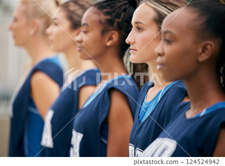 Sports, Netball and team of women with motivation, focus and strong mindset stand in row. Collaboration, teamwork and support of professional team serious before competition game or training workout 124524942