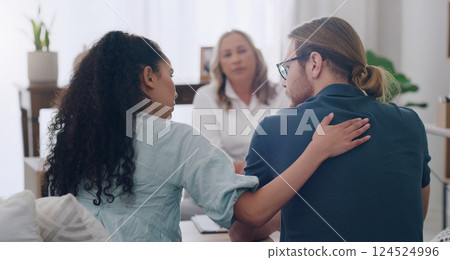 Marriage, counselling and couple in therapist office giving comfort, care and talking to partner. Man and black woman with social worker or psychologist for problem, support and help in relationship 124524996