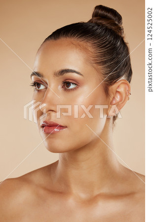 Beauty, skincare and makeup aesthetic with woman in studio for dermatology, cosmetics and skin health, wellness and glow. Face of female model inspiration for facial, self care and luxury care Beauty, skincare and makeup aesthetic with woman in studio for dermatology, cosmetics and skin health, wellness and glow. Face of female model inspiration for facial, self care and luxury care 124525002