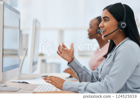 Call center, computer and woman talking at desk in telemarketing, customer service and CRM office. Female with headset working as sales, customer support and contact us consultant for advice and help 124525019