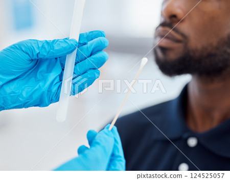 Doctor hands, compliance and a covid test with black man with testing kit in a clinic or hospital. Safety, medical pcr and healthcare hand, glove or corona check before with cotton swab and test tube Doctor hands, compliance and a covid test with black man with testing kit in a clinic or hospital. Safety, medical pcr and healthcare hand, glove or corona check before with cotton swab and test tube 124525057