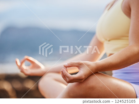 Hands, meditation and yoga with a woman outdoor for mental health in calm or serene environment. Fitness, exercise and meditate with a female yogi training for wellness, balance or spiritual zen 124525105