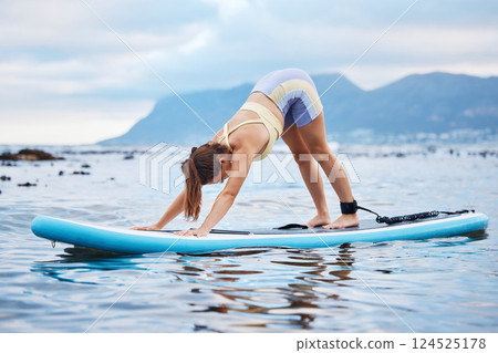 Surfer woman, surfboard and stretching on water, beach or yoga practice for peace, wellness or calm. Female, surf and warm up seaside for workout, stretch or exercise outdoor for health or fitness Surfer woman, surfboard and stretching on water, beach or yoga practice for peace, wellness or calm. Female, surf and warm up seaside for workout, stretch or exercise outdoor for health or fitness 124525178