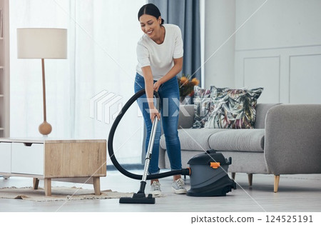 Black woman vacuum cleaner, smile in living room and cleaning tiles floor in home for hygiene. Woman cleaner, happy with appliance for housekeeping work on flooring in house for dust or dirt indoors Black woman vacuum cleaner, smile in living room and cleaning tiles floor in home for hygiene. Woman cleaner, happy with appliance for housekeeping work on flooring in house for dust or dirt indoors 124525191
