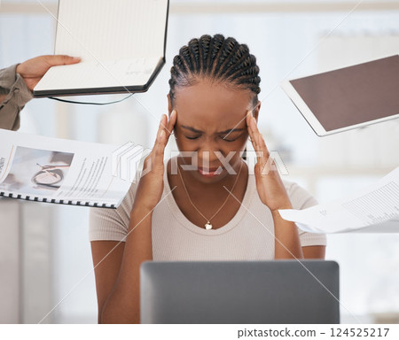 Headache, stress and burnout of black woman in office on laptop overwhelmed by task deadlines. Multitasking, mental health and sad, anxiety or depression of female employee working in finance job. Headache, stress and burnout of black woman in office on laptop overwhelmed by task deadlines. Multitasking, mental health and sad, anxiety or depression of female employee working in finance job. 124525217