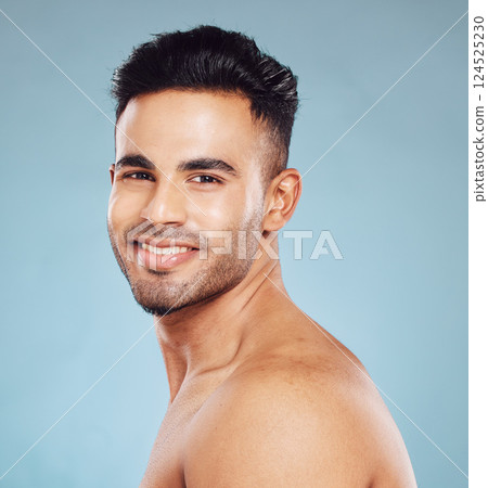Skincare, smile and portrait of a man with clean facial hair, wellness and happy against blue mockup studio background. Beauty, cleaning and face of a model with happiness from cosmetic dermatology Skincare, smile and portrait of a man with clean facial hair, wellness and happy against blue mockup studio background. Beauty, cleaning and face of a model with happiness from cosmetic dermatology 124525230