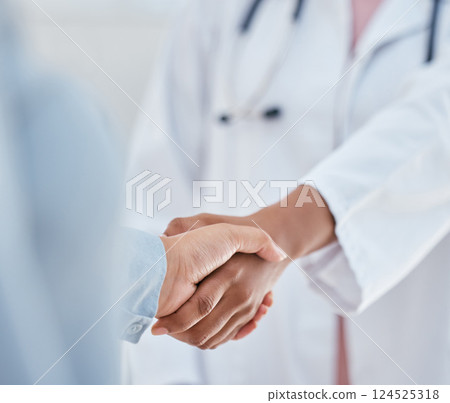 Handshake, trust and thank you with patient and doctor or medical worker shaking hands, greeting or introduction during consultation. People hand welcome gesture or welcome, partnership or help Handshake, trust and thank you with patient and doctor or medical worker shaking hands, greeting or introduction during consultation. People hand welcome gesture or welcome, partnership or help 124525318