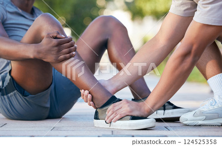 Feet, hands and sports injury by fitness friends on the floor during exercise in the city, holding and hurt. Shoes, hand and ankle pain by sport people on ground for injury, muscle and foot problem Feet, hands and sports injury by fitness friends on the floor during exercise in the city, holding and hurt. Shoes, hand and ankle pain by sport people on ground for injury, muscle and foot problem 124525358