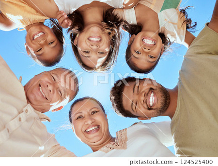 Huddle, below and big family with love, care and support together in nature against a blue sky. Grandparents, children and portrait of parents with trust, happy and smile on a holiday to relax 124525400