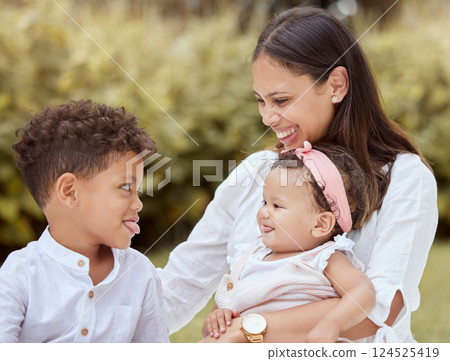 Family, happy and children with a mother having fun with tongue out gesture in a nature park. Kids, comic and funny quality time of a mom, boy and baby together with happiness, love and youth Family, happy and children with a mother having fun with tongue out gesture in a nature park. Kids, comic and funny quality time of a mom, boy and baby together with happiness, love and youth 124525419