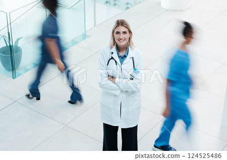 Busy, healthcare and doctor woman in hospital portrait for leadership, trust and leadership with motivation, innovation and proud of career. Business medical professional worker for our vision above 124525486