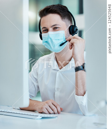 Call center, face mask and covid office with telemarketing, CRM and customer support man at desk. Portrait of contact us agent, sales and customer service male consultant at computer during covid 19 Call center, face mask and covid office with telemarketing, CRM and customer support man at desk. Portrait of contact us agent, sales and customer service male consultant at computer during covid 19 124525648