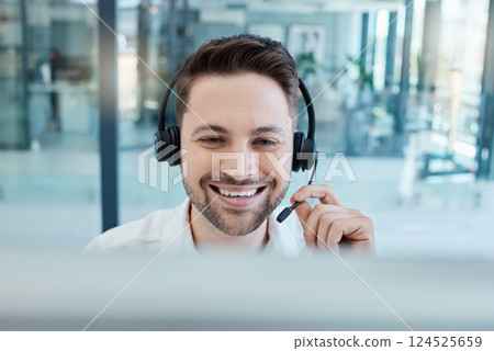 Call center, smile and face of a man consulting, working and in communication on a computer at a crm telemarketing company. Happy, support and help from a customer service consultant on the internet 124525659