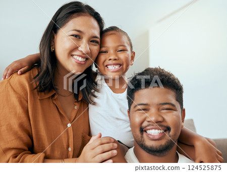 Happy family, mother and father with child in a portrait enjoying quality time with big smiles on their faces. Young kid, mama and dad love relaxing together on a living room sofa in a house in Peru 124525875