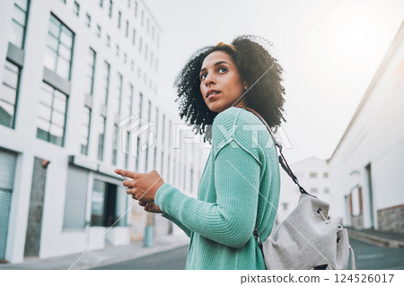 Smartphone, city and black woman student walking to campus, university or college and location search, social media, 5g network. Gen z girl on cellphone for outdoor communication in urban street Smartphone, city and black woman student walking to campus, university or college and location search, social media, 5g network. Gen z girl on cellphone for outdoor communication in urban street 124526017
