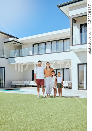 Portrait, real estate and happy family moving into their new luxury home, house or property in summer. Happy parents and children standing with a smile outdoor with building investment or purchase Portrait, real estate and happy family moving into their new luxury home, house or property in summer. Happy parents and children standing with a smile outdoor with building investment or purchase 124526127