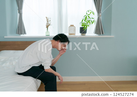 A young man with poor physical condition A young man with poor physical condition 124527274