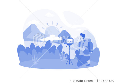 A photographer captures sunrise shots at a scenic location. 124528389