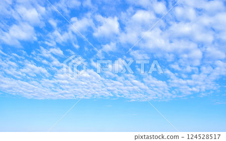 Cloud spreading in the blue sky Cloud spreading in the blue sky 124528517