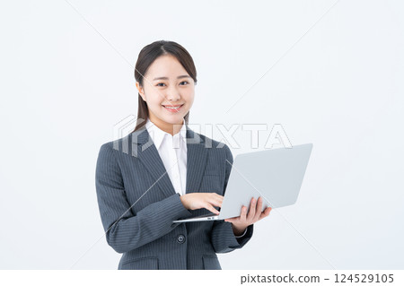 Young business woman using a computer 124529105