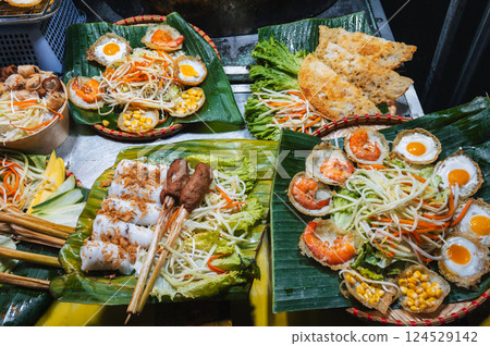 traditional Vietnamese street food on the counter at the Asian Night Market in Vietnam in Asia in Da Nang traditional Vietnamese street food on the counter at the Asian Night Market in Vietnam in Asia in Da Nang 124529142