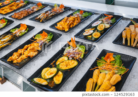 Asian buffet in hotel in Asia. Vietnamese food and dishes at the self-service restaurant for breakfast in Vietnam 124529163