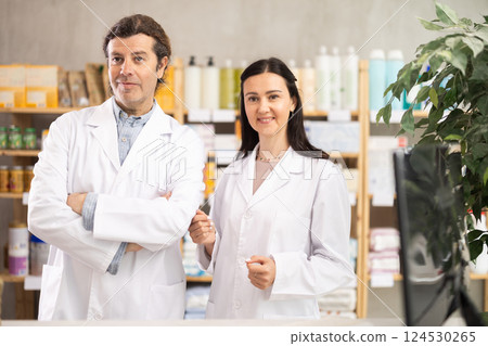 Two pharmacists invite you to shop 124530265