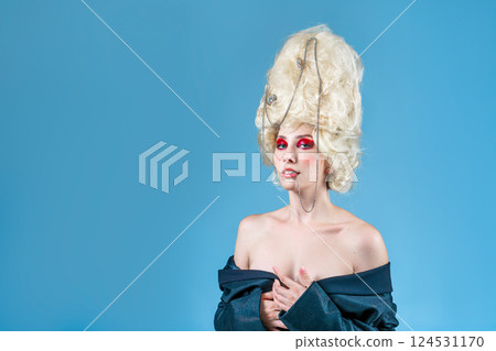 Glamorous female model with blond wig and Glamorous female model with blond wig and 124531170