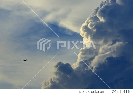 Cumulonimbus and airplane Cumulonimbus and airplane 124531416