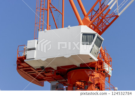 Close-up of the control room of a climbing crane. Image of a construction site Close-up of the control room of a climbing crane. Image of a construction site 124532784