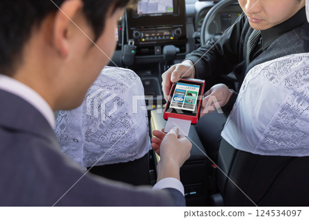 Taxi fare Card payment Card reader 124534097