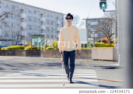 Visually impaired, taxi, white cane 124534171