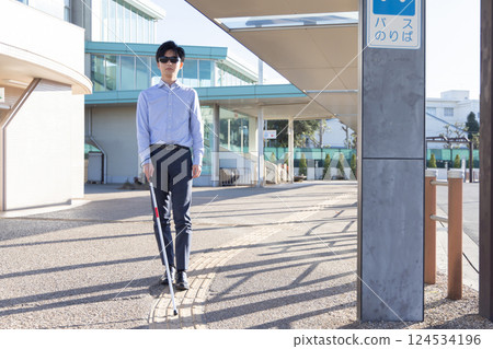 Visually impaired, taxi, white cane 124534196