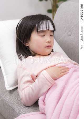 Quiet rest time with a girl sleeping with a cold 124535166